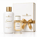 Load image into Gallery viewer, Tabor Olive Sensual body wash and matching perfume set with a white and gold body wash bottle, a small clear glass perfume bottle with pale amber liquid, and a white gift box with a gold ribbon bow.
