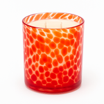 Load image into Gallery viewer, Orange and red spotted candle jar on a white background. 
