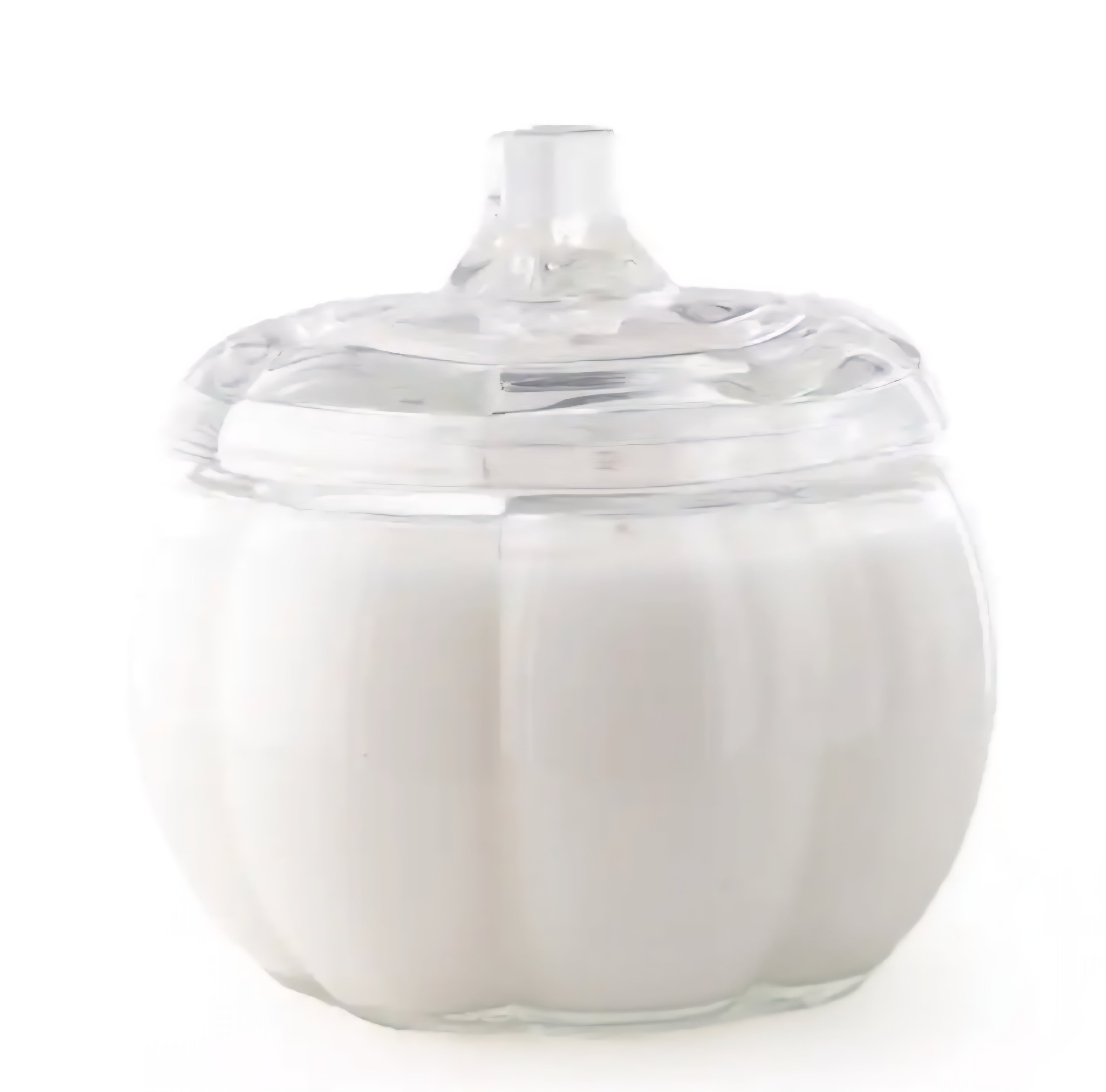 White glass pumpkin candle with a clear glass lid on a white background