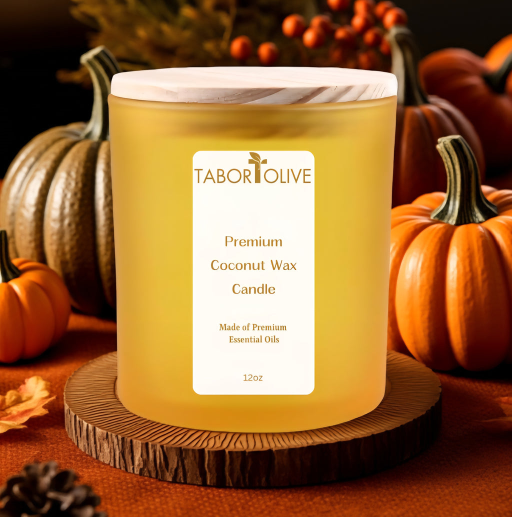 Tabor Olive candle with pumpkins and autumn decorations in the background